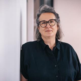 Portrait de Nan Vandenbroeck, responsable RH chez DNS Belgium, en charge des ressources humaines et du développement des talents.