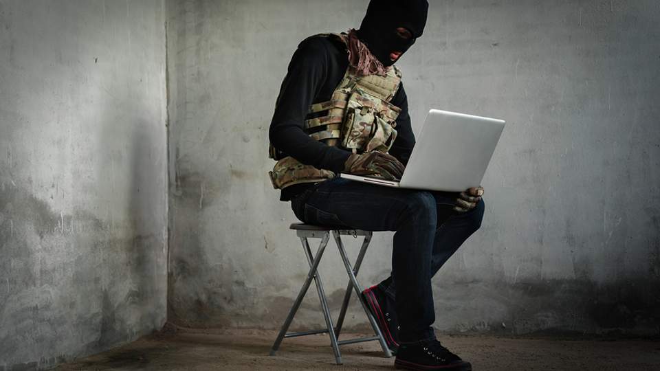 Cyber soldier with laptop